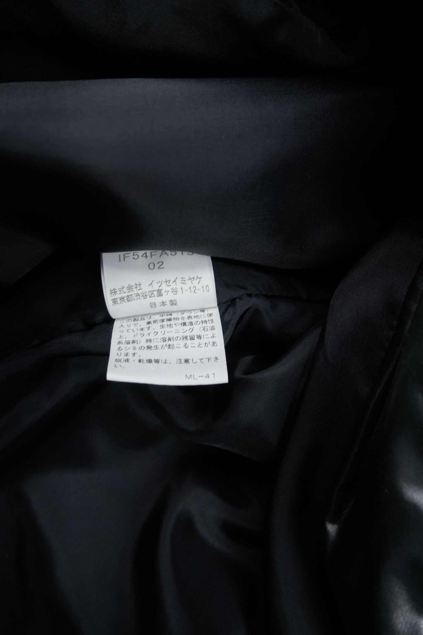 Issey Miyake FETE rubbish bag coat