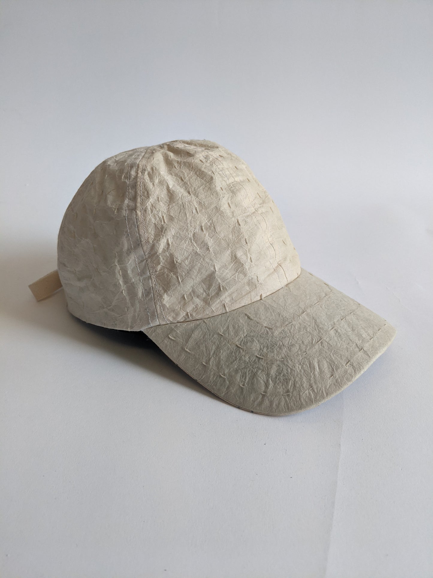 DNJ paper off white paper cap